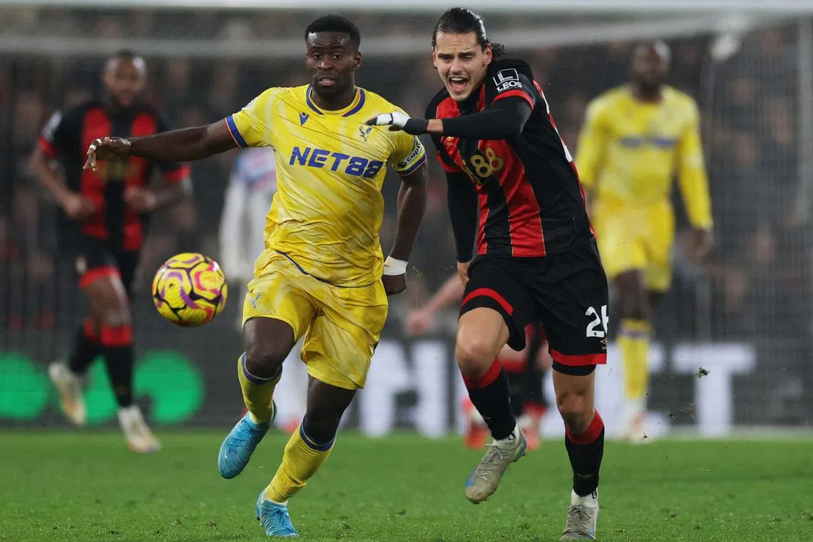 FILE PHOTO: Soccer Football - Premier League - AFC Bournemouth v Crystal Palace - Vitality Stadium, Bournemouth, Britain - December 26, 2024  Crystal Palace's Marc Guehi in action with AFC Bournemouth's Enes Unal Action Images via Reuters/Paul Childs/File Photo