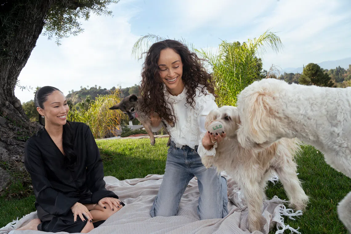 Stephanie Suganami (left) and Cara Santana Leto, who created Lil Luv Dog, a beauty brand for dogs, based on their experiences with their own dogs: Sheppy, Binx and Mercer.