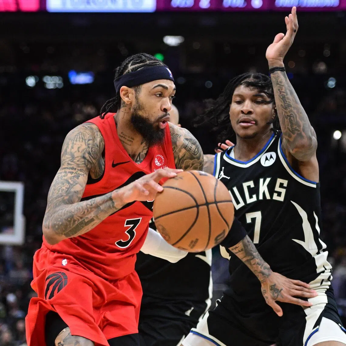 Toronto Raptors forward Brandon Ingram drives for the basket against Milwaukee Bucks guard Kevin Porter in the second quarter at Fiserv Forum. 