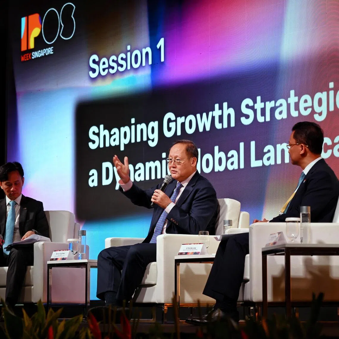 Minister for Trade and Industry (Energy and Industry) Tan See Leng (centre) speaking at a panel discussion with Cambodia’s Minister of Industry, Science, Technology, and Innovation Hem Vanndy (right). The panel is moderated by Intellectual Property Office of Singapore chief executive Tan Kong Hwee.