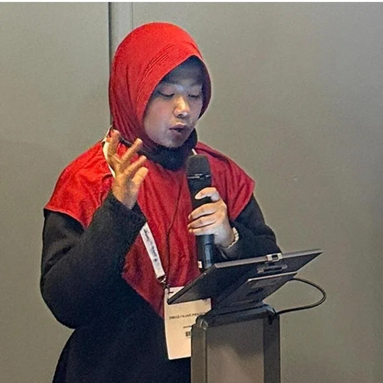 Indonesian researcher Prihantini presenting under two different names at the International Society of Pneumonia and Pneumococcal Diseases conference in Copenhagen, Denmark, on May 18.