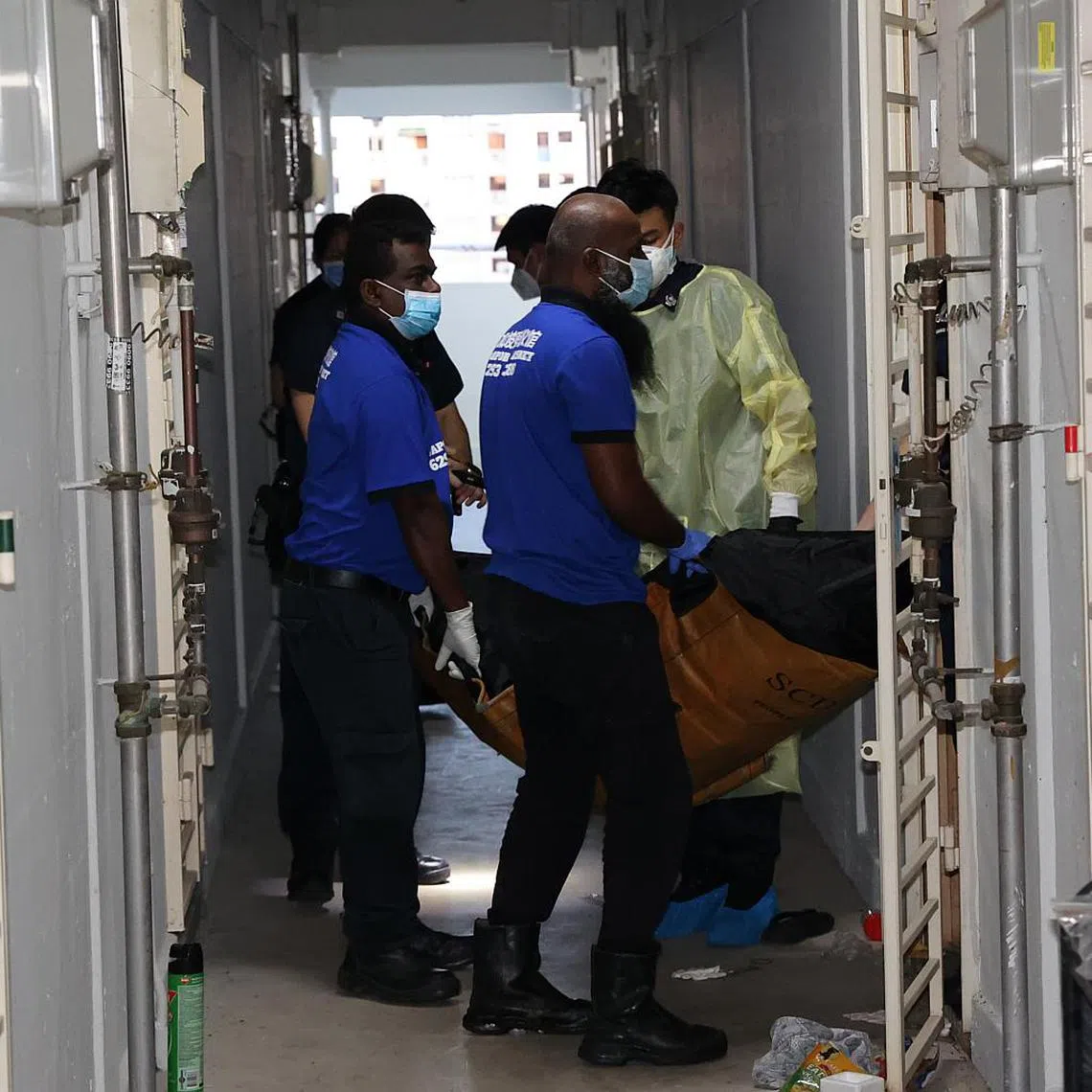 A 69-year-old woman was found lying motionless in a unit at Block 100 Aljunied Crescent on Jan 8, 2023.