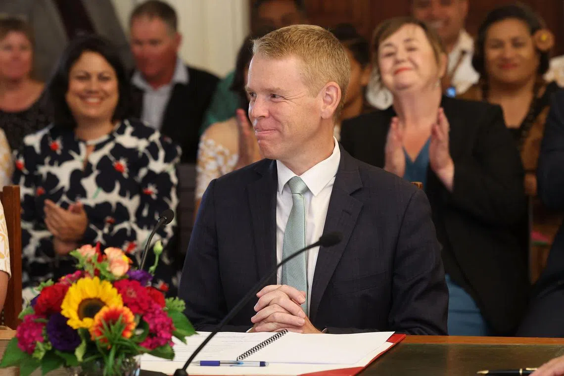 New Zealand's new Prime Minister Chris Hipkins smiles as he is sworn in during a ceremony at The Government House in Wellington on Jan 25, 2023. 