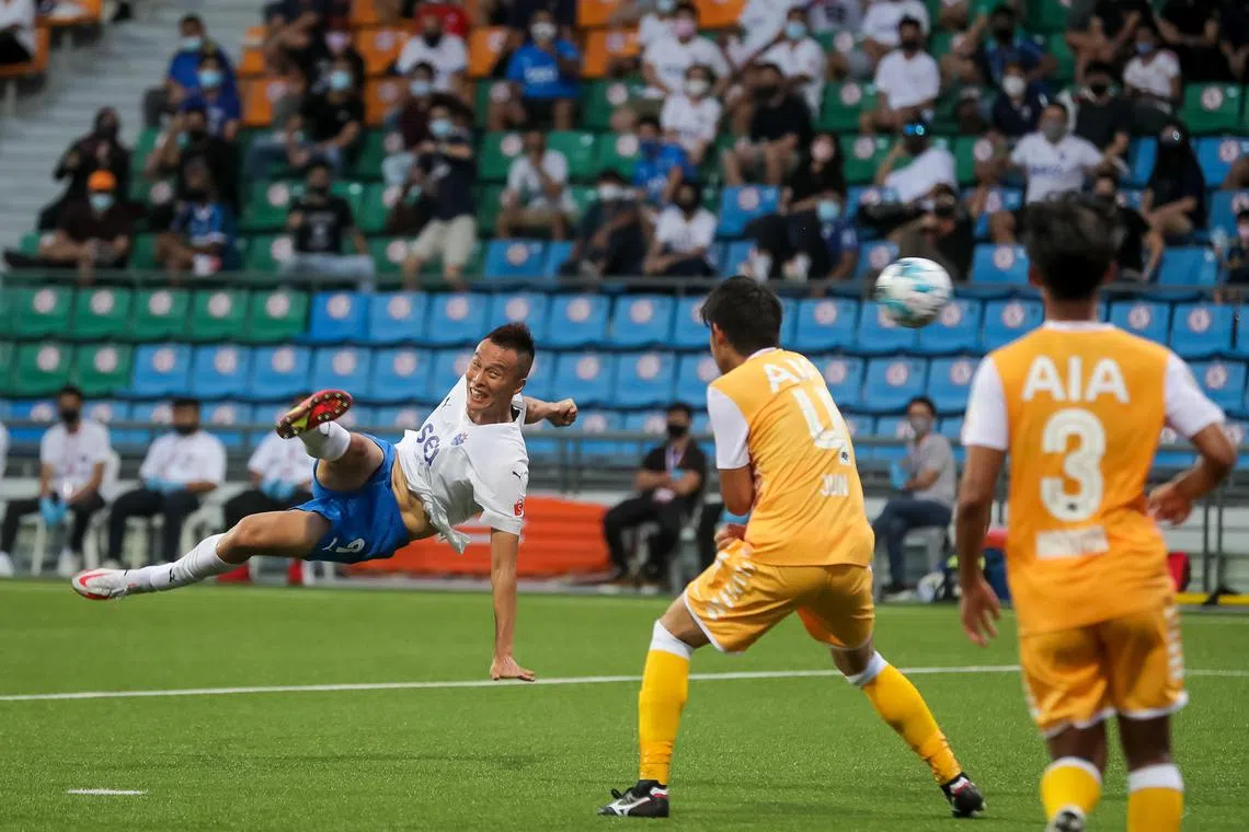 Lion City Sailors’ Kim Shin Wook (white, 9) scoring a goal against Albirex Niigata (yellow) during the Singapore Premier League Community Shield match at Jalan Besar Stadium, 19 Feb 2022.