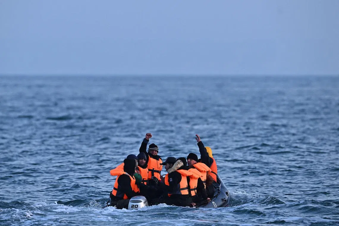 Migrants head for the UK on an inflatable boat across the English Channel.