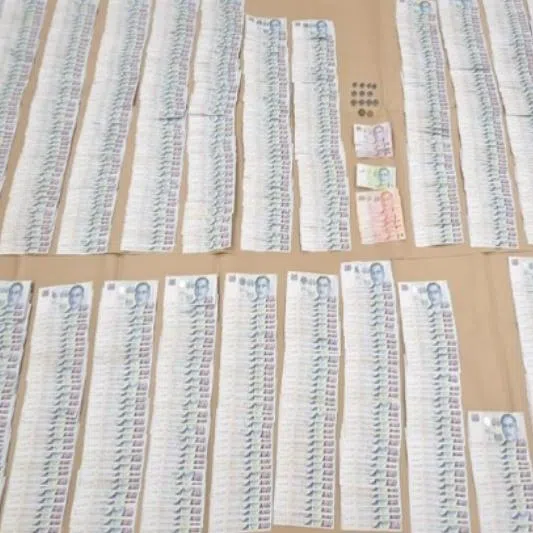 Cash amounting to about $50,000 was recovered and seized as a case exhibit.