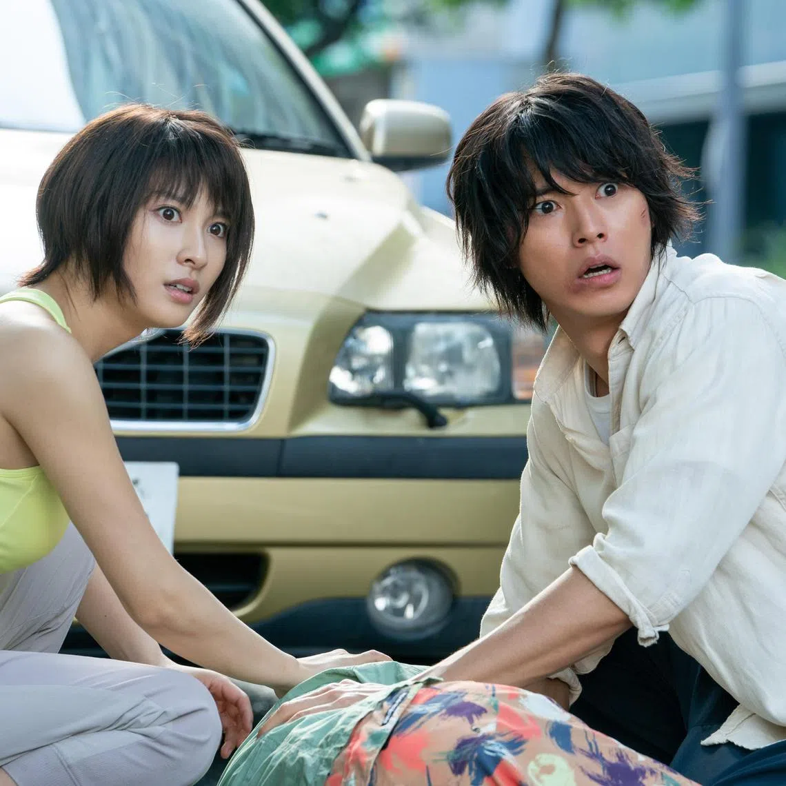 Tao Tsuchiya (left) and Kento Yamazaki reprise their roles as Usagi and Arisu in season two of Alice In Borderland.
