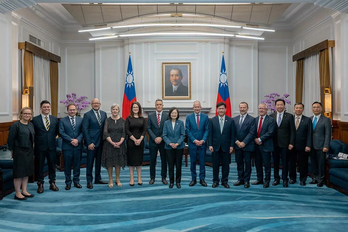 Taiwan President Tsai Ing-wen (centre) with members of the Australian Parliamentary delegation in Taipei on Sept 26.