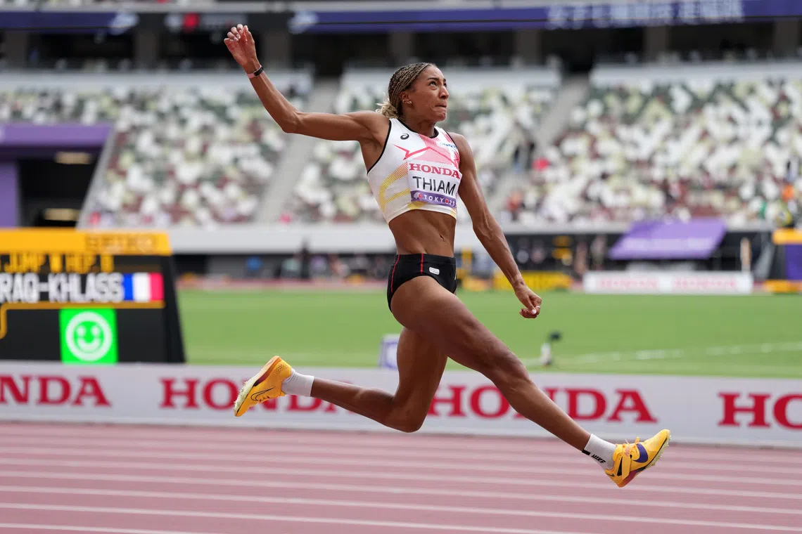 Sep 20, 2025; Tokyo, , Japan; Nafissatou Thiam aka Nafi Thiam (BEL) competes in the heptathlon long jump during the World Athletics Championships at National Stadium. Mandatory Credit: Kirby Lee-Imagn Images