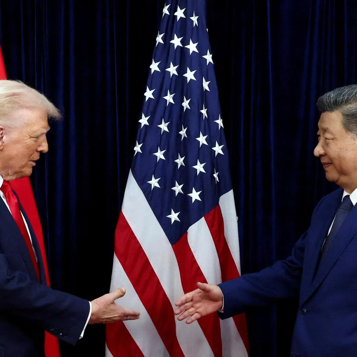 US President Donald Trump (left) had asked China to delay his summit with Mr Xi Jinping by around a month.