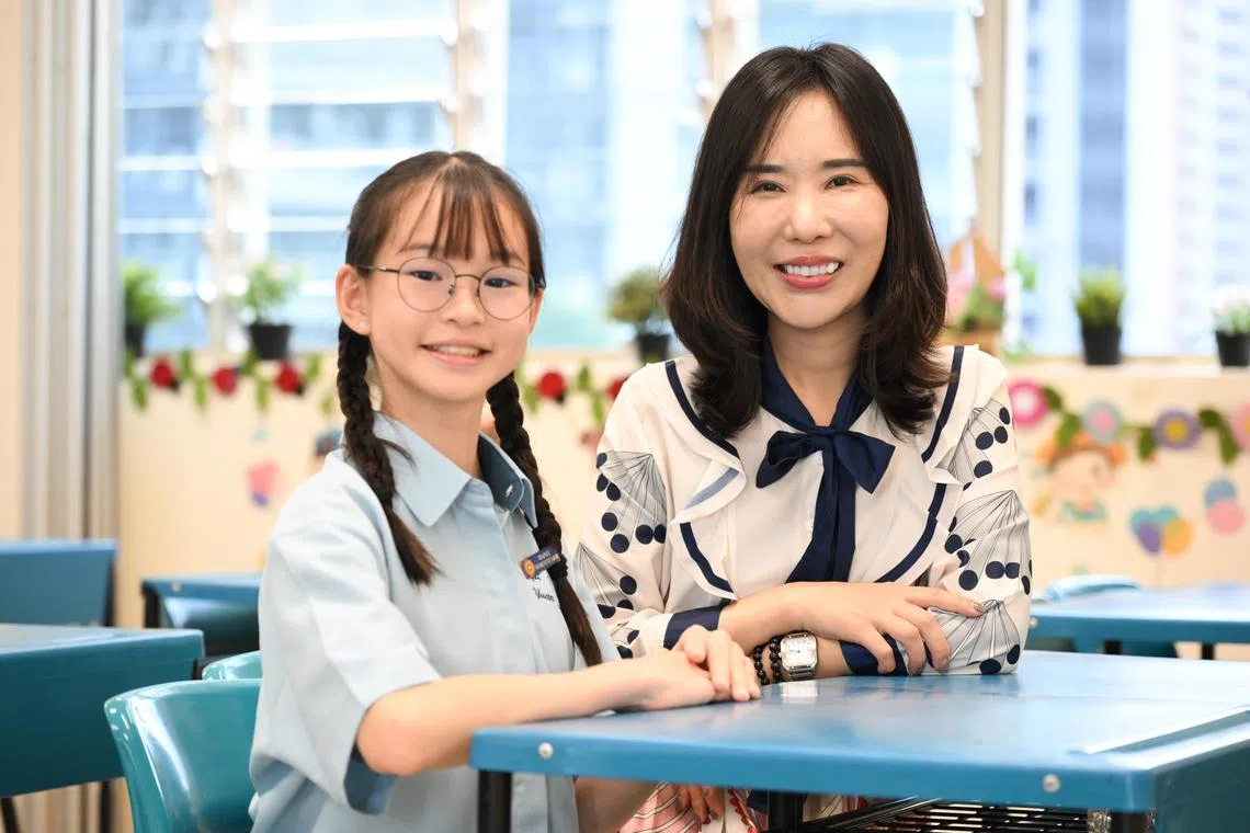 Ms Nan Zhonghua supported her Sec 1 student Hazel Chong through academic challenges at Yuan Ching Secondary School.