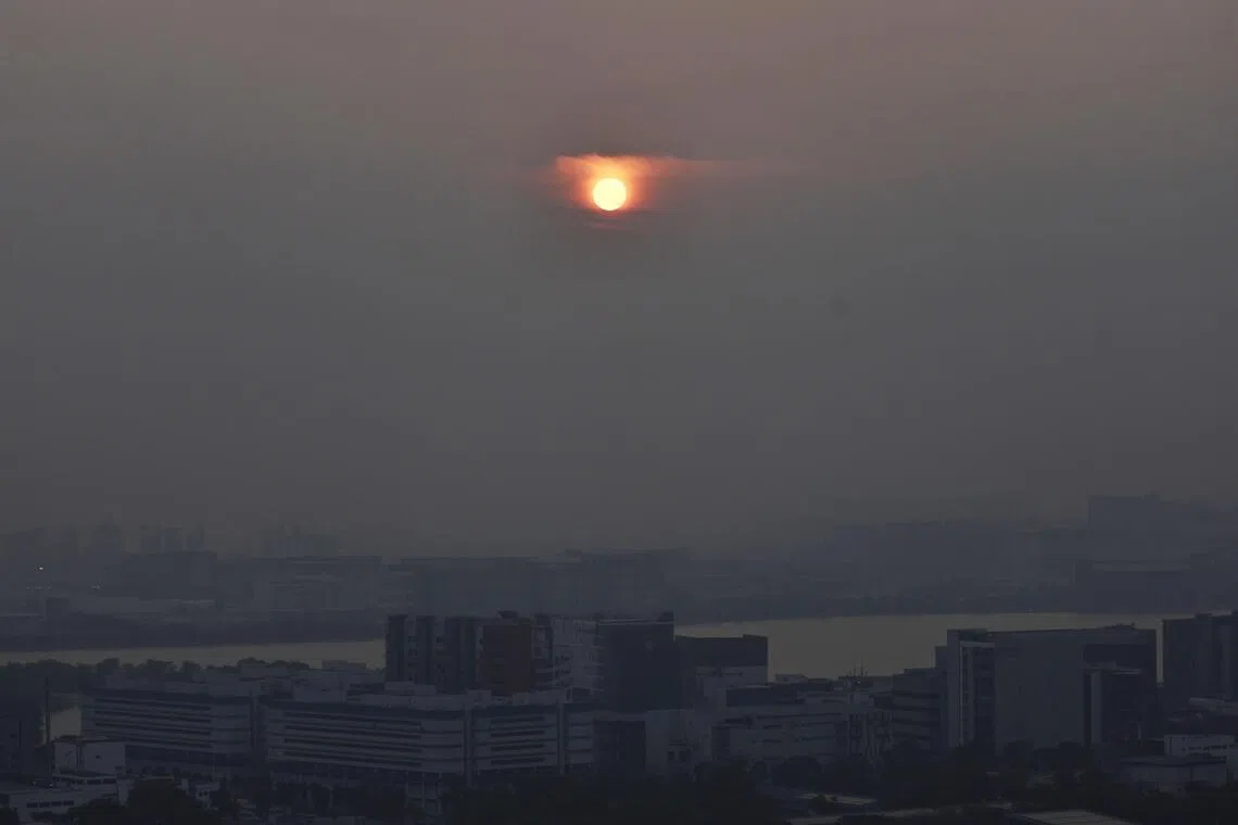 Hazy conditions as seen from Clementi in the direction of Jurong Island on the evening of Oct 6.