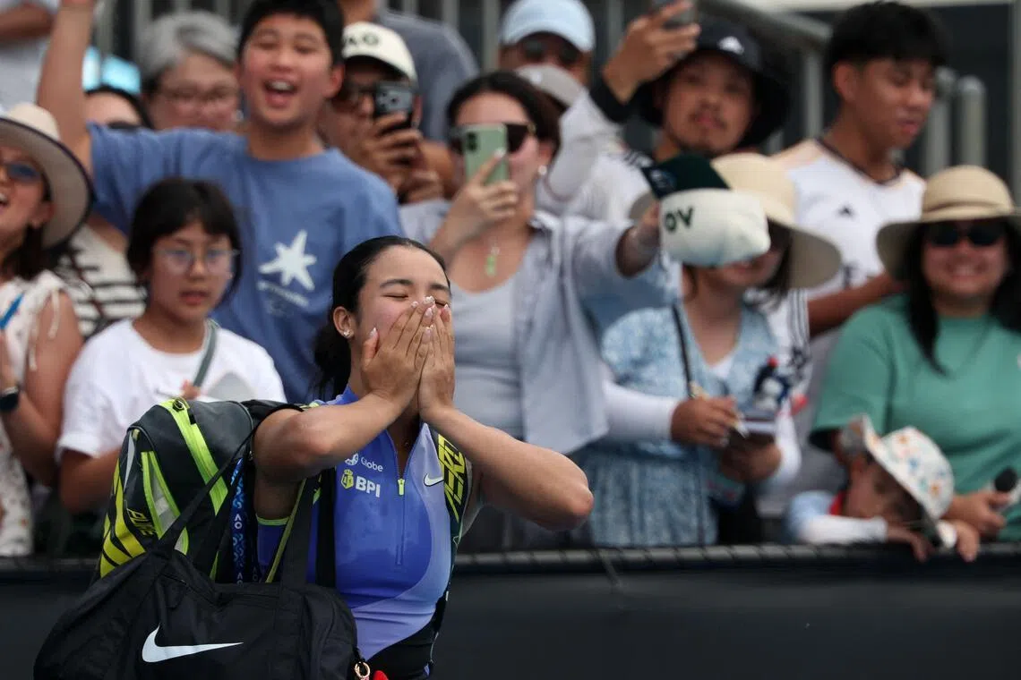 Alexandra Eala of the Philippines acknowledging the fans as she leaves the court after her 0-6, 6-3, 6-2 defeat by American Alycia Parks during their Australian Open first-round clash in Melbourne on Jan 19.