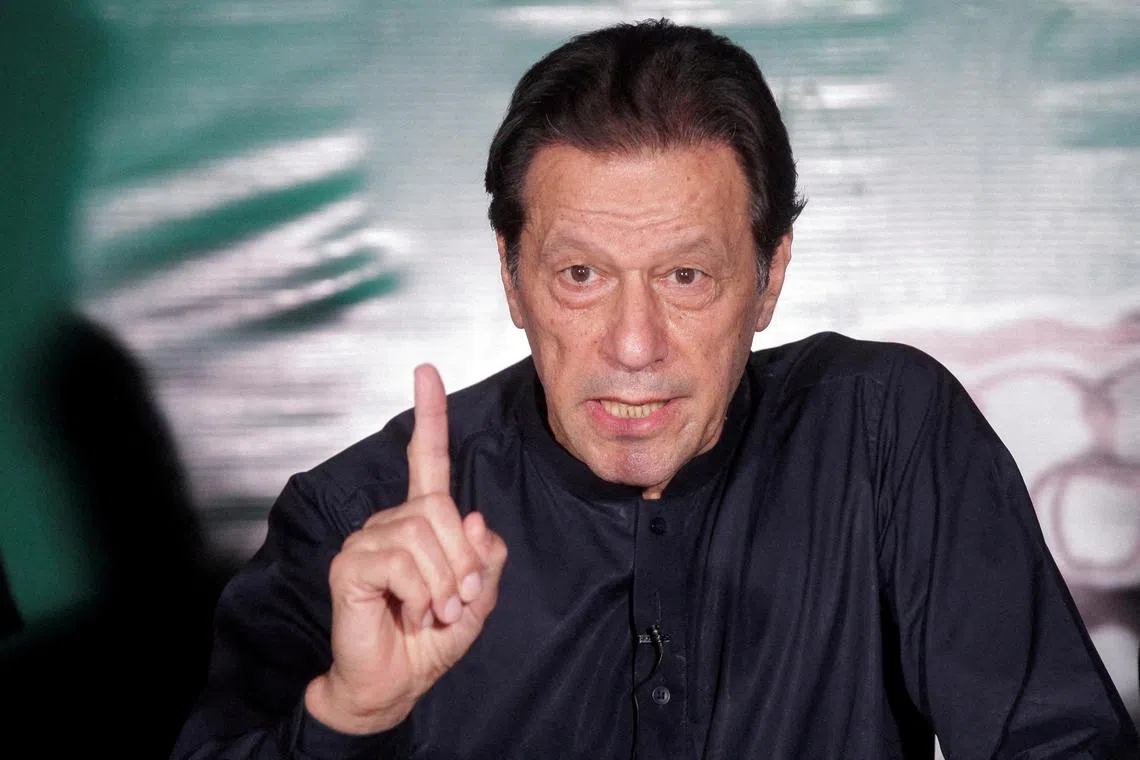  Pakistan's former Prime Minister Imran Khan gestures as he speaks to the members of the media at his residence in Pakistan in 2023.