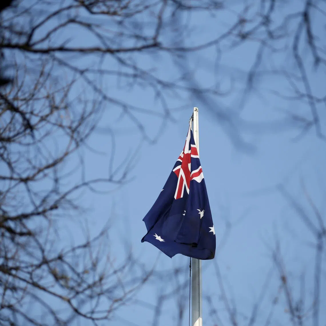 FILE PHOTO: An Australian flag is pictured at its embassy in Beijing, China January 24, 2019. REUTERS/Jason Lee/File photo