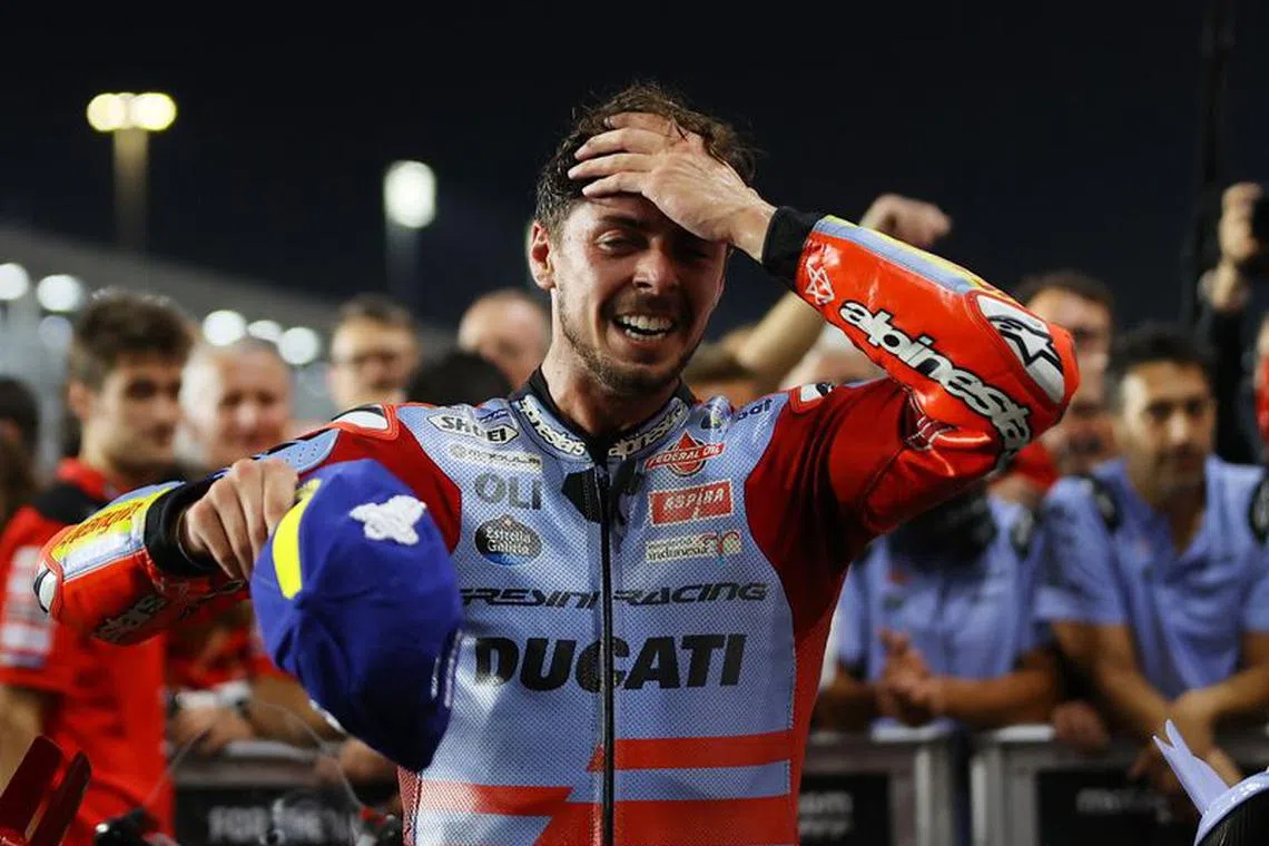 MotoGP - Grand Prix of Qatar - Lusail International Circuit, Lusail, Qatar - November 19, 2023 Gresini Racing MotoGP's Fabio Di Giannantonio celebrates after winning the Grand Prix of Qatar REUTERS/Ibraheem Al Omari