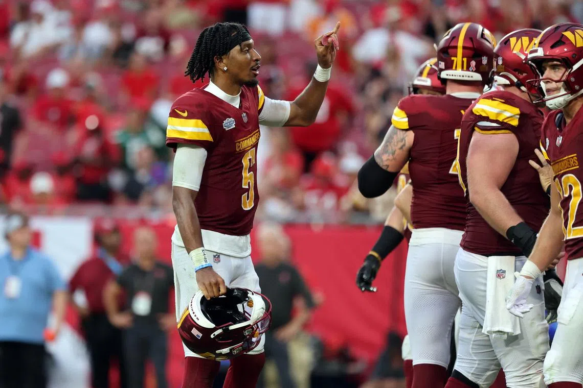 FILE PHOTO: Sep 8, 2024; Tampa, Florida, USA;  Washington Commanders quarterback Jayden Daniels (5) against the Tampa Bay Buccaneers during the second half at Raymond James Stadium. Mandatory Credit: Kim Klement Neitzel-Imagn Images/File Photo
