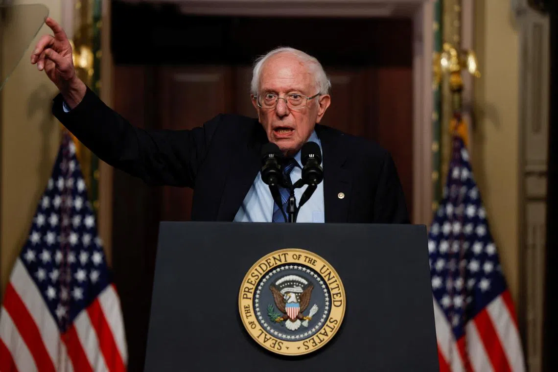 FILE PHOTO: U.S. Senator Bernie Sanders (I-VT) gestures while delivering remarks on lowering healthcare costs, in the Indian Treaty Room of the Eisenhower Executive Office building, at the White House complex in Washington, U.S., April, 3, 2024. REUTERS/Evelyn Hockstein/File Photo