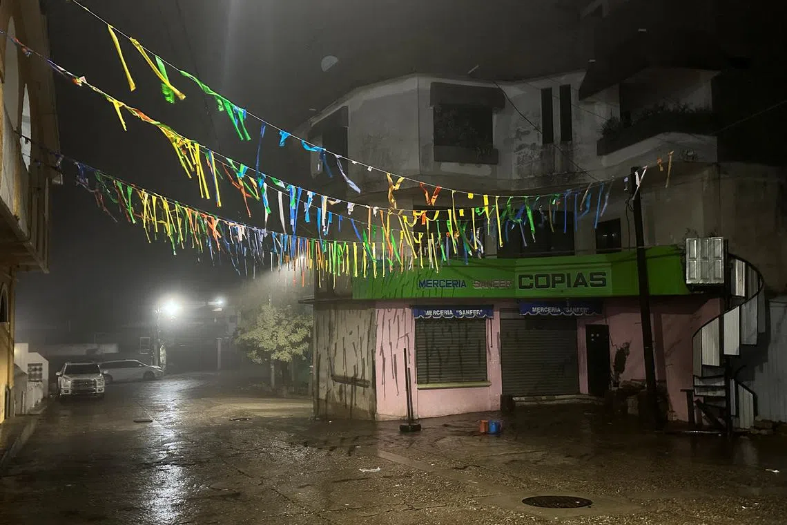 An empty street is seen as Hurricane John makes landfall in Santiago Jamiltepec, Oaxaca state, Mexico September 23, 2024. REUTERS/Fredy Garcia