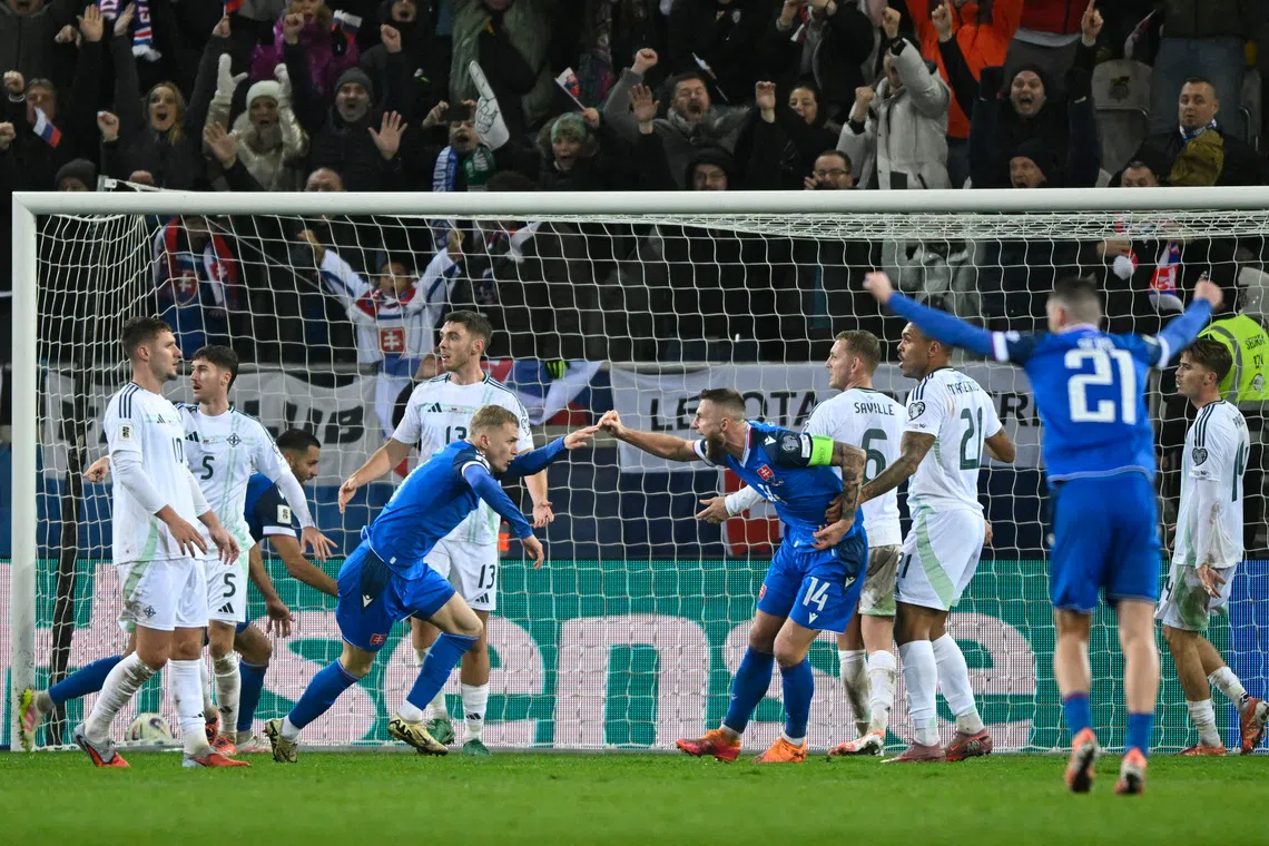 Soccer Football - World Cup - UEFA Qualifiers - Group A - Slovakia v Northern Ireland - Kosicka Futbalova Arena, Kosice, Slovakia - November 14, 2025 Slovakia's Robert Bozenik celebrates scoring their first goal REUTERS/Radovan Stoklasa
