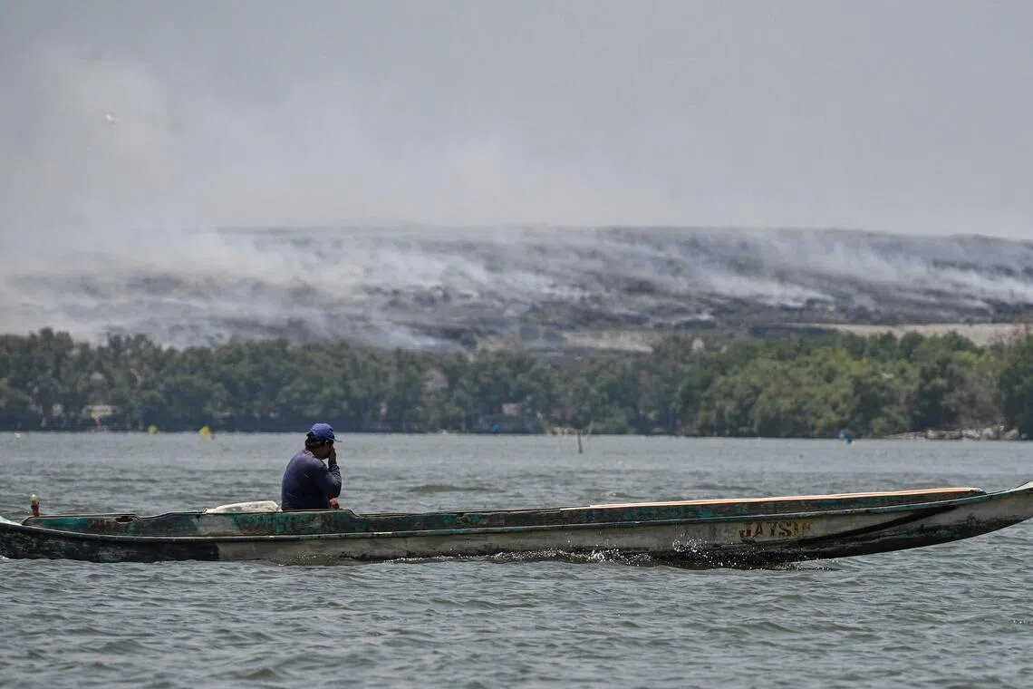 Manila landfill fire leaves Filipinos gasping for clean air