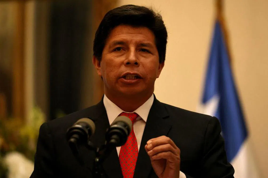 Peru's President Pedro Castillo delivers a statement to the media along with Chile's President Gabriel Boric at the La Moneda government palace in Santiago, Chile, November 29, 2022. REUTERS/Ivan Alvarado/ File Photo