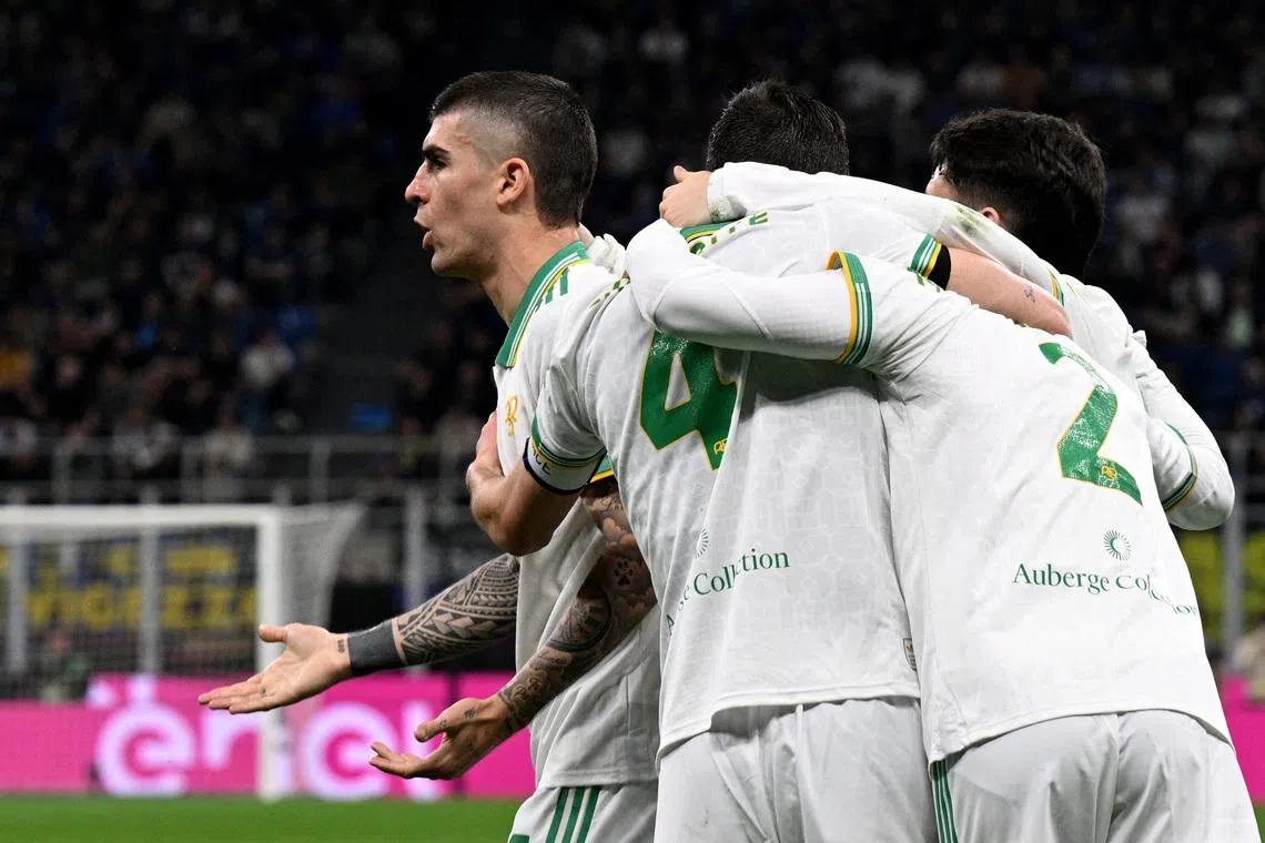 Soccer Football - Serie A - Inter Milan v AS Roma - San Siro, Milan, Italy - April 5, 2026 AS Roma's Gianluca Mancini celebrates scoring their first goal with teammates REUTERS/Jennifer Lorenzini/ File Photo