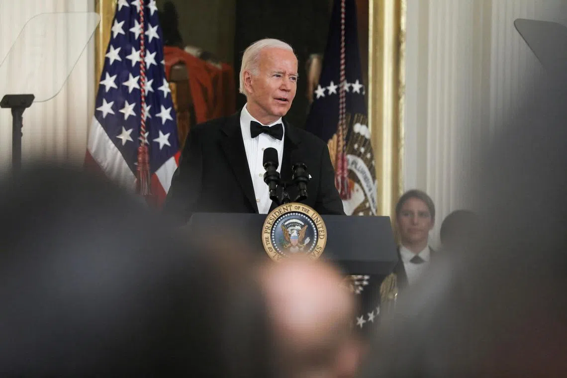 US President Joe Biden speaks during a reception for the Kennedy Center Honorees in the East Room of the White House in Washington, on Dec 4, 2022. 