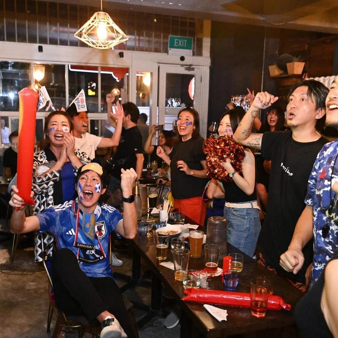 ST20221205-202237217335-Lim Yaohui-Deepanraj Ganesan-Dgsoc05/
Japanese fans watching the match as Japan take on Croatia in the 2022 World Cup round of 16 match during a screening at SG TAPS bar in Duxton Hill on Dec 6, 2022. Croatia beat Japan 3-1 on penalties after a 1-1 draw.
(ST PHOTO: LIM YAOHUI)