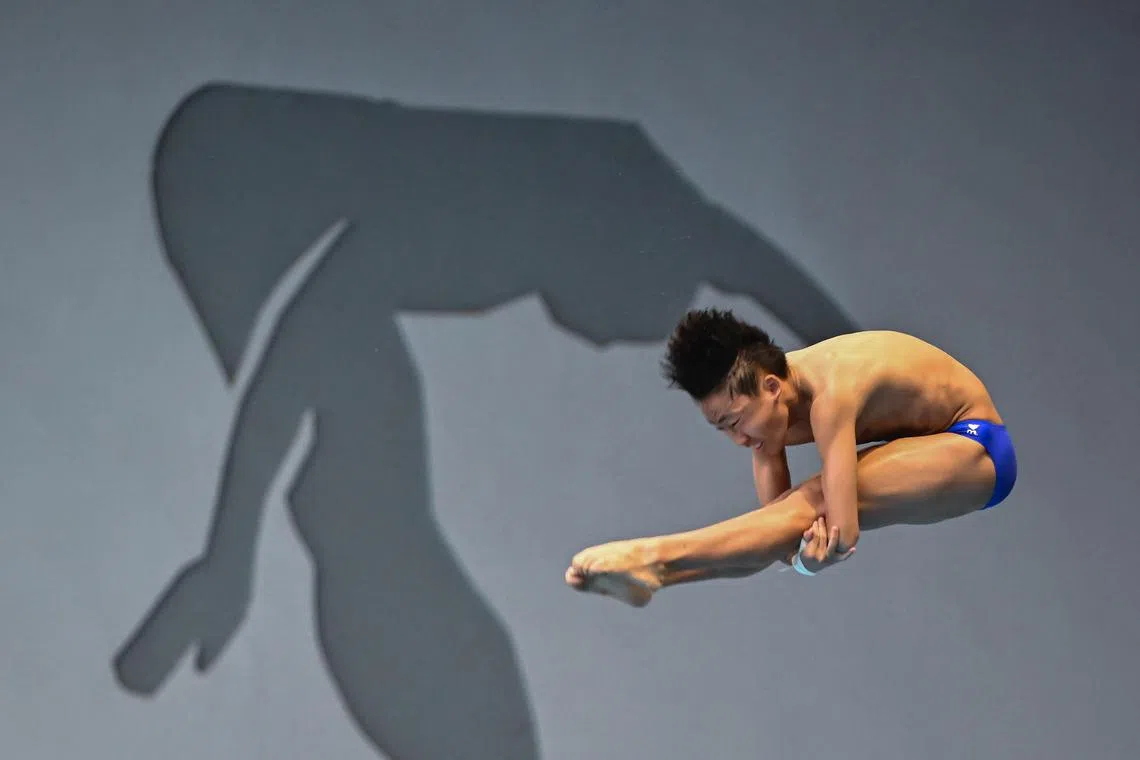 Max Lee on his way to a bronze in the men's platform diving with his score of 362.80 points. 