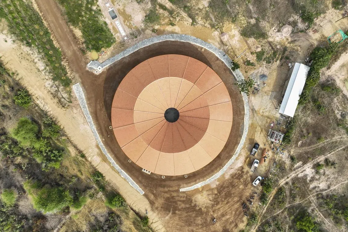 Swiss architecture and design firm atelier oï’s circular building concept derives from the gong's place in Asian spiritual practices. Its sound is considered sacred, bridging the physical and spiritual worlds and marking the beginning and end of ceremonies. Its resonance shapes the musical atmosphere and gathers communities. The firm's approach, termed "Storytexture", is centred on translating these vibrations into physical form. The circular structure symbolises this concept, visible from an aerial perspective

Copyright:  SMILING GECKO CAMBODIA