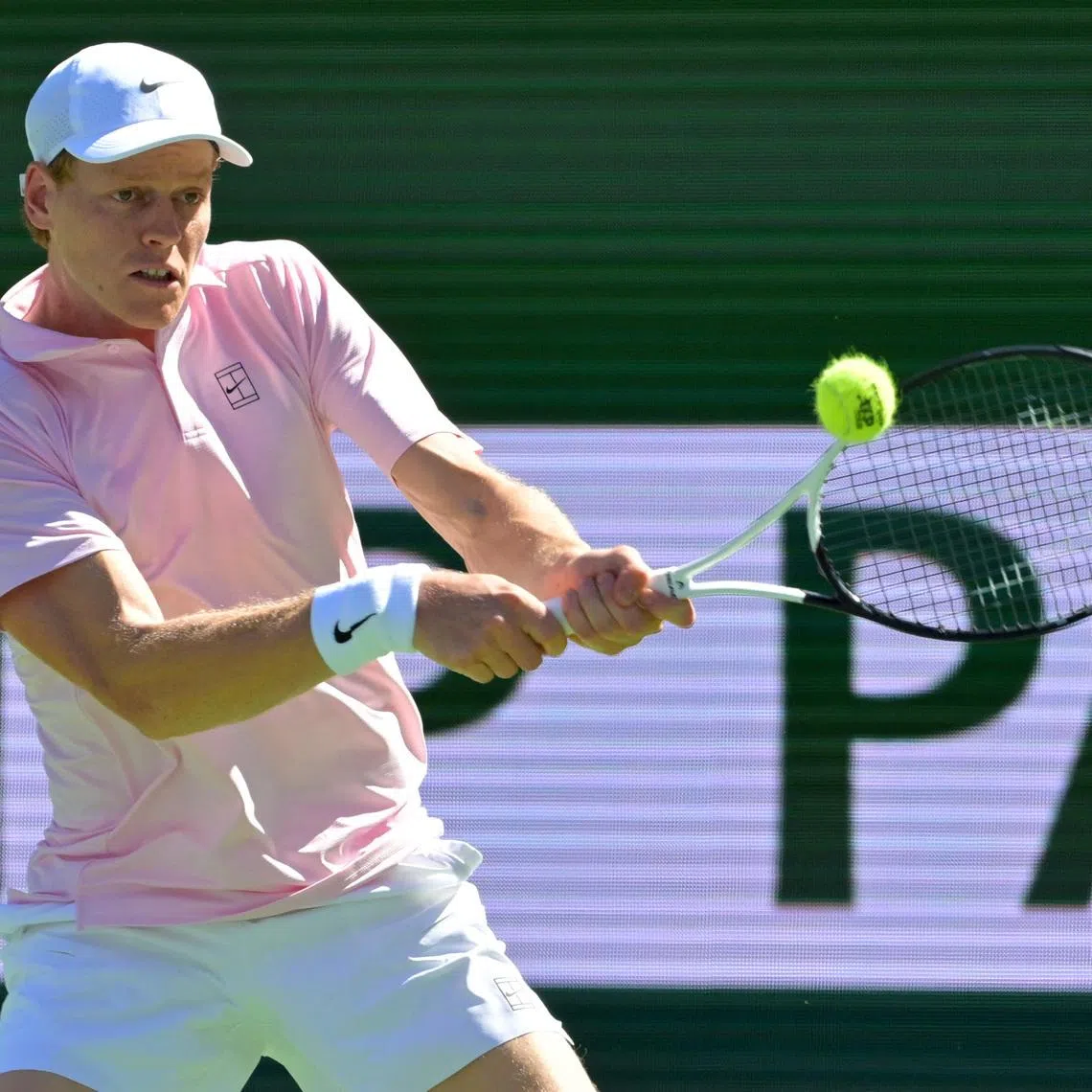 Mar 14, 2026; Indian Wells, CA, USA; Jannik Sinner (ITA) hits a shot as he defeated Alexander Zverev (GER) in the semifinal of the BNP Paribas Open at the Indian Wells Tennis Garden. Mandatory Credit: Jayne Kamin-Oncea-Imagn Images