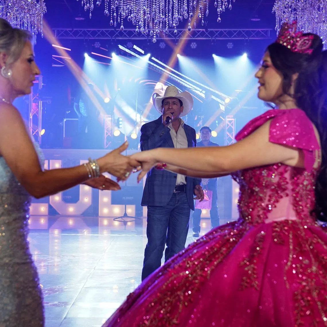 Bobby Pulido, a Latin Grammy winner and Democratic candidate for Texas 15th Congressional District, performs during a quinceanera celebration in Edinburg, Texas, U.S. August 1, 2026.  REUTERS/Gabriel V. Cardenas