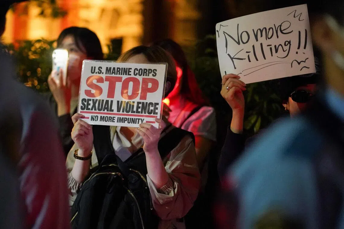 A US marine was arrested for allegedly killing and robbing a 39-year-old woman in Naha on Oct 3, prompting public outrage.