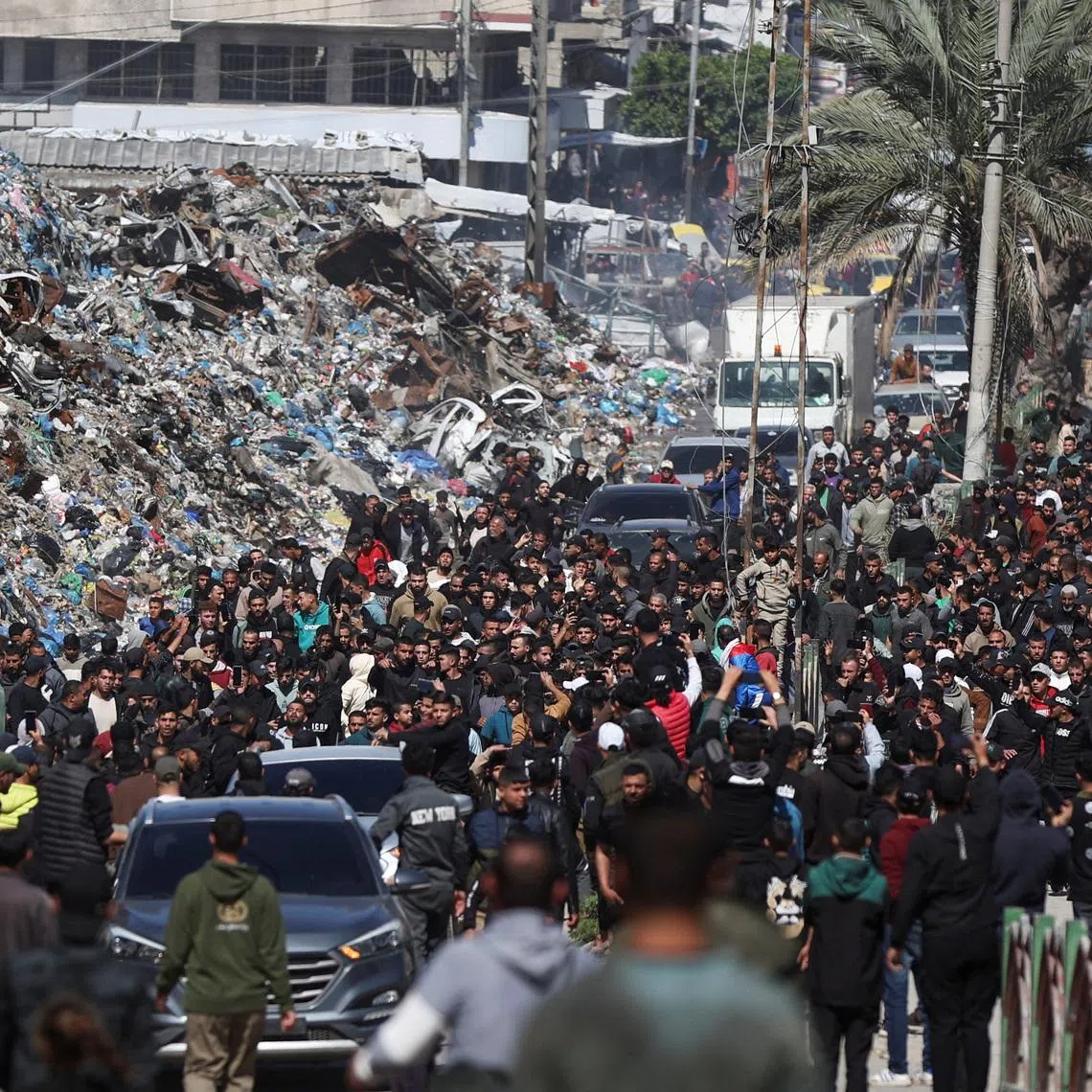 Mourners attend the funeral of Palestinians killed in an Israeli strike, according to medics, in Gaza City, March 28, 2026. REUTERS/Dawoud Abu Alkas