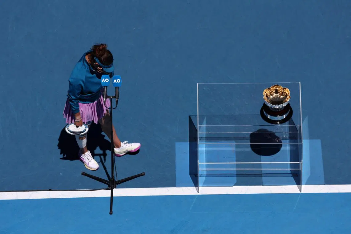 India's Sania Mirza reacts after a defeat during the mixed doubles final at the Australian Open in Melbourne, on Jan 27.