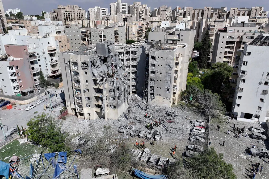 FILE PHOTO: A drone view shows an impacted residential site, following an early morning missile attack from Iran on Israel, in Be'er Sheva, Israel June 24, 2025. REUTERS/Yonatan Honig/File Photo