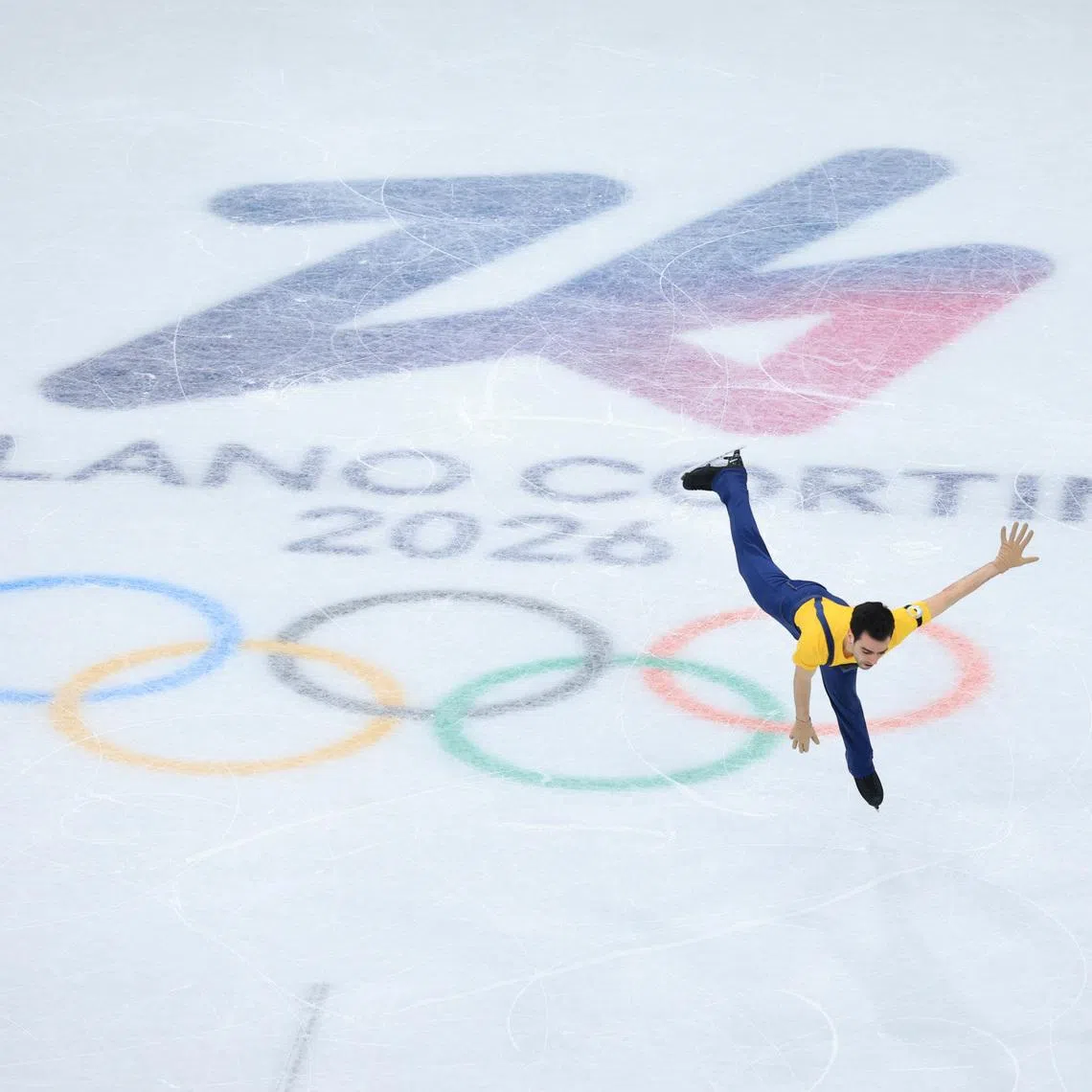 Feb 10, 2026; Milan, Italy; Tomas Guarino Sabate of Spain competes in men's singles short program during the Milano Cortina 2026 Olympic Winter Games at Milano Ice Skating Arena. Mandatory Credit: Katie Stratman-Imagn Images