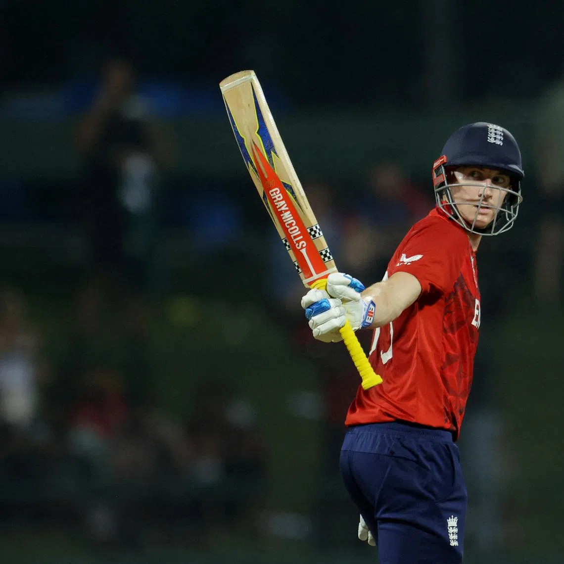 Cricket - ICC Men's T20 World Cup 2026 - Super 8 - England v Pakistan - Pallekele International Cricket Stadium, Kandy, Sri Lanka - February 24, 2026 England's Harry Brook celebrates after reaching his half century REUTERS/Lahiru Harshana