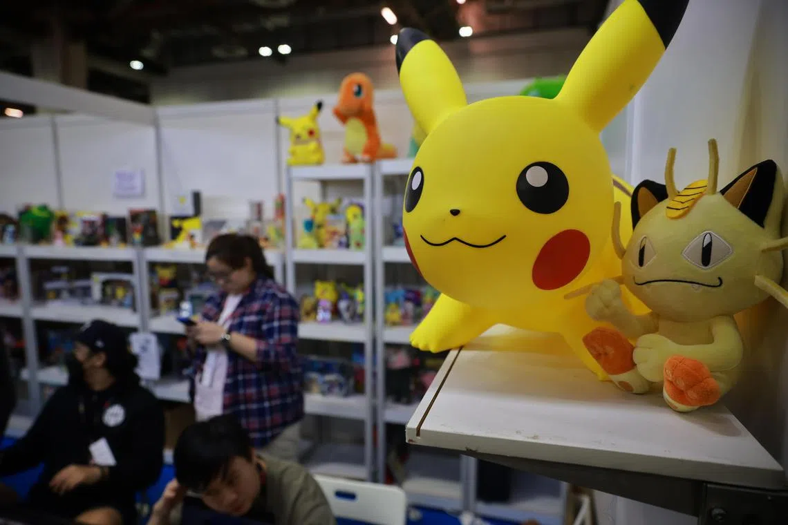 Vendor booths selling merchandise inspired by Pokemon and other characters from popular games, comics, films and television shows during Singapore Comic Con at the Sands Expo & Convention Centre on Sunday (Dec 11, 2022). 