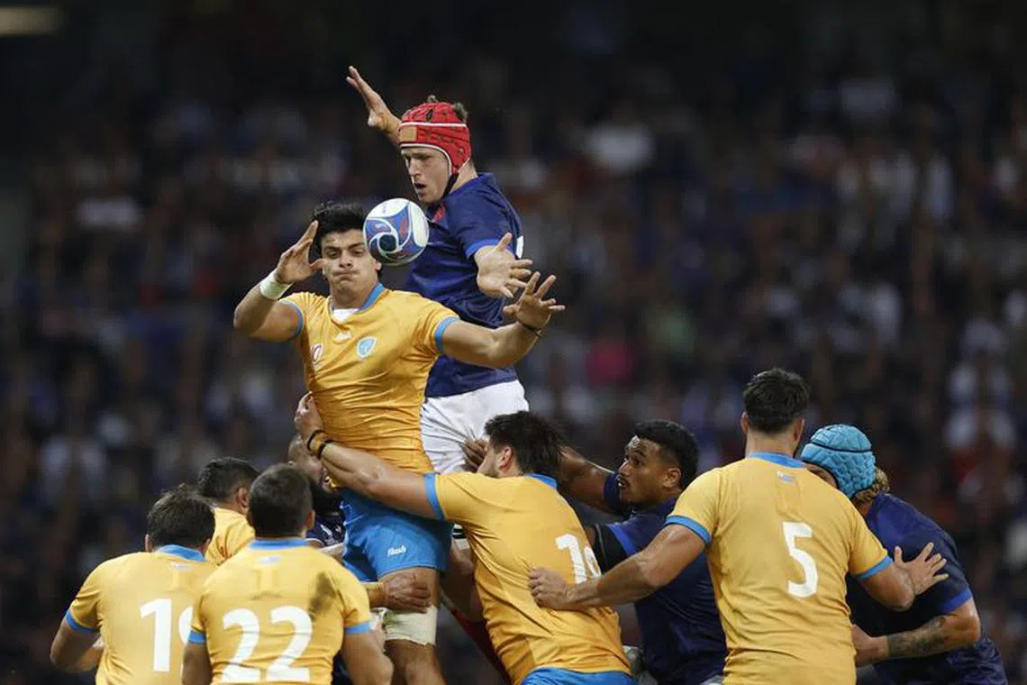 Rugby Union - Rugby World Cup 2023 - Pool A - France v Uruguay - Stade Pierre-Mauroy, Lille, France - September 14, 2023 France's Thibaud Flament in action with Uruguay's Lucas Bianchi REUTERS/Peter Cziborra