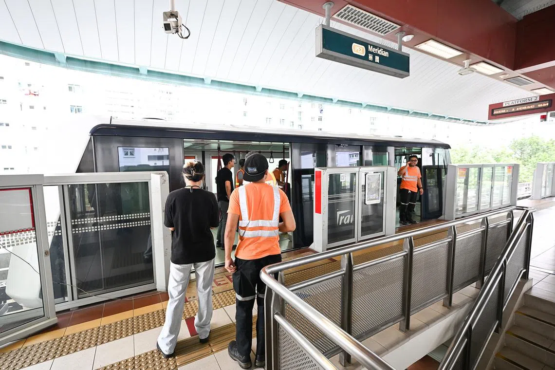 SBS Transit staff working on recovering a stalled LRT train at Meridian LRT station at 11.48am on Aug 15.