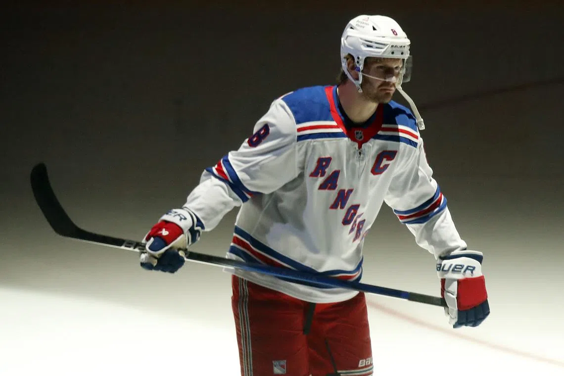 FILE PHOTO: Oct 9, 2024; Pittsburgh, Pennsylvania, USA;  New York Rangers defenseman Jacob Trouba (8) takes the ice against the Pittsburgh Penguins during the first period at PPG Paints Arena. Mandatory Credit: Charles LeClaire-Imagn Images/File Photo