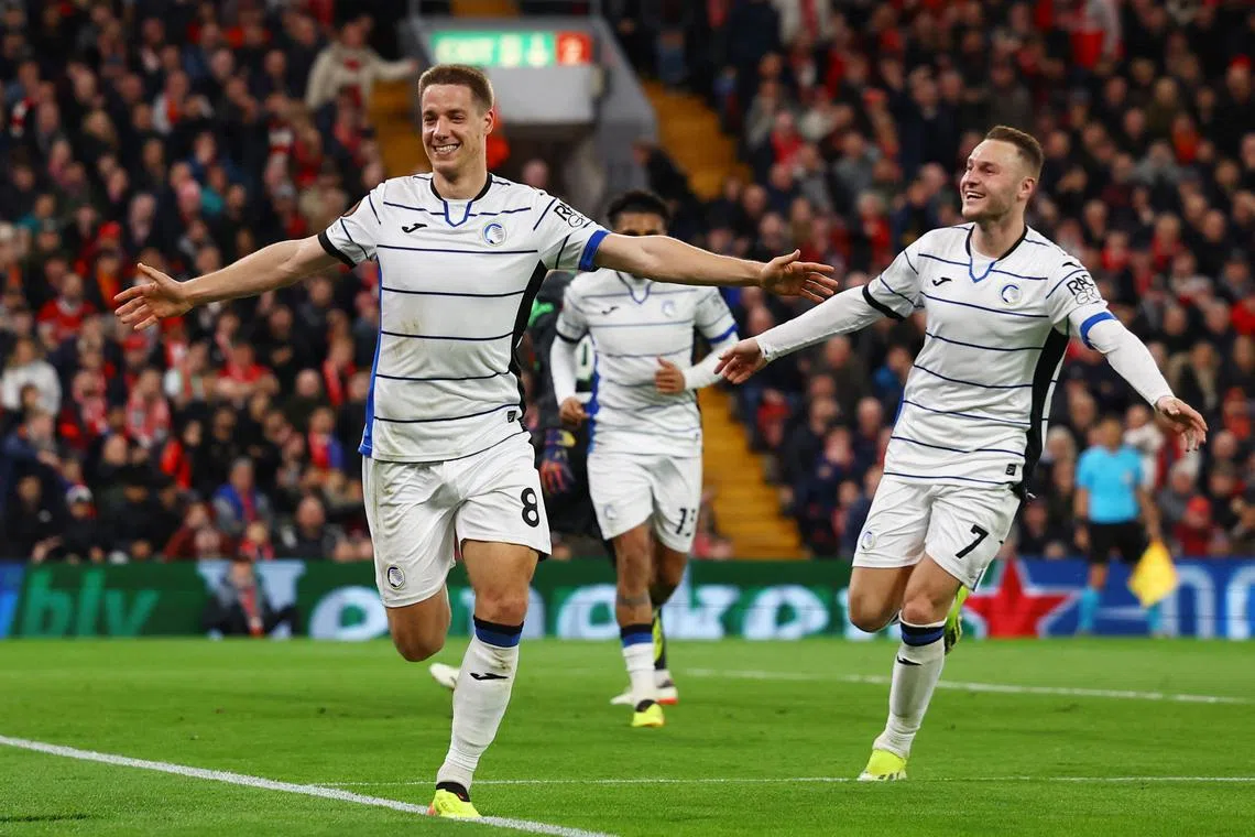 Soccer Football - Europa League - Quarter Final - First Leg - Liverpool v Atalanta - Anfield, Liverpool, Britain - April 11, 2024 Atalanta's Mario Pasalic celebrates scoring their third goal with Teun Koopmeiners Action Images via Reuters/Lee Smith