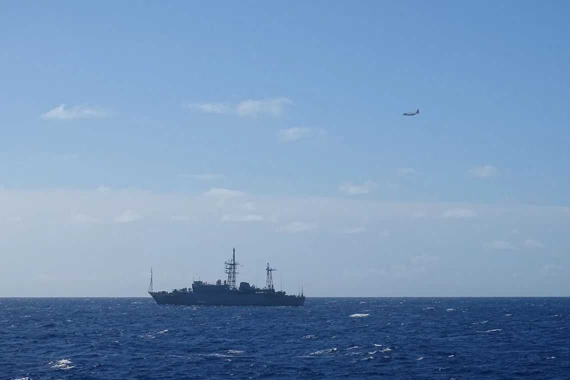A Coast Guard HC-130 Hercules airplane crew from Air Station Barbers Point monitors a Russian military vessel, south of Oahu, Hawaii, U.S., October 29, 2025.  U.S. Coast Guard/Cutter William Hart/Handout via REUTERS  THIS IMAGE HAS BEEN SUPPLIED BY A THIRD PARTY