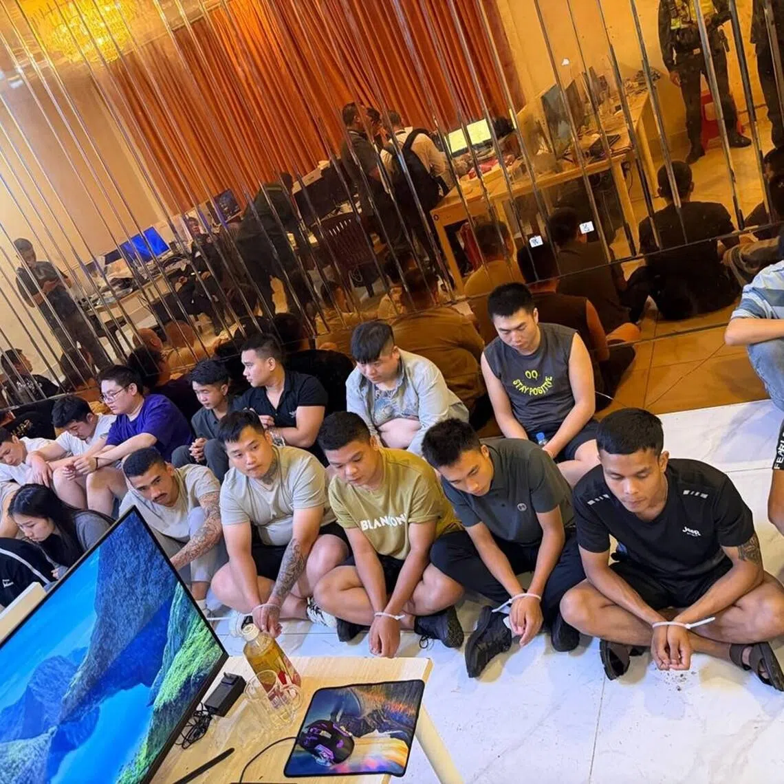 The authorities detained 81 people and seized phones, computers and wigs. 