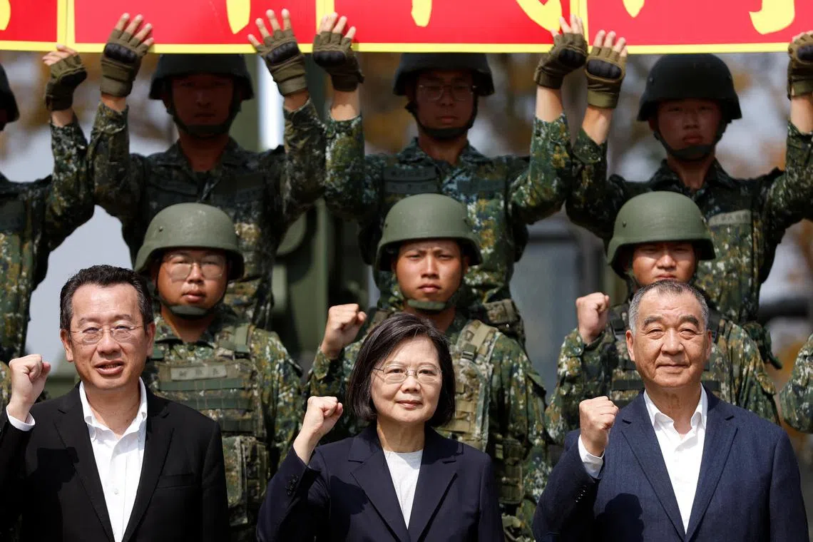 Taiwan President Tsai Ing-wen posing for pictures among soldiers during a visit to a military base in Chiayi, Taiwan on March 25, 2023. 