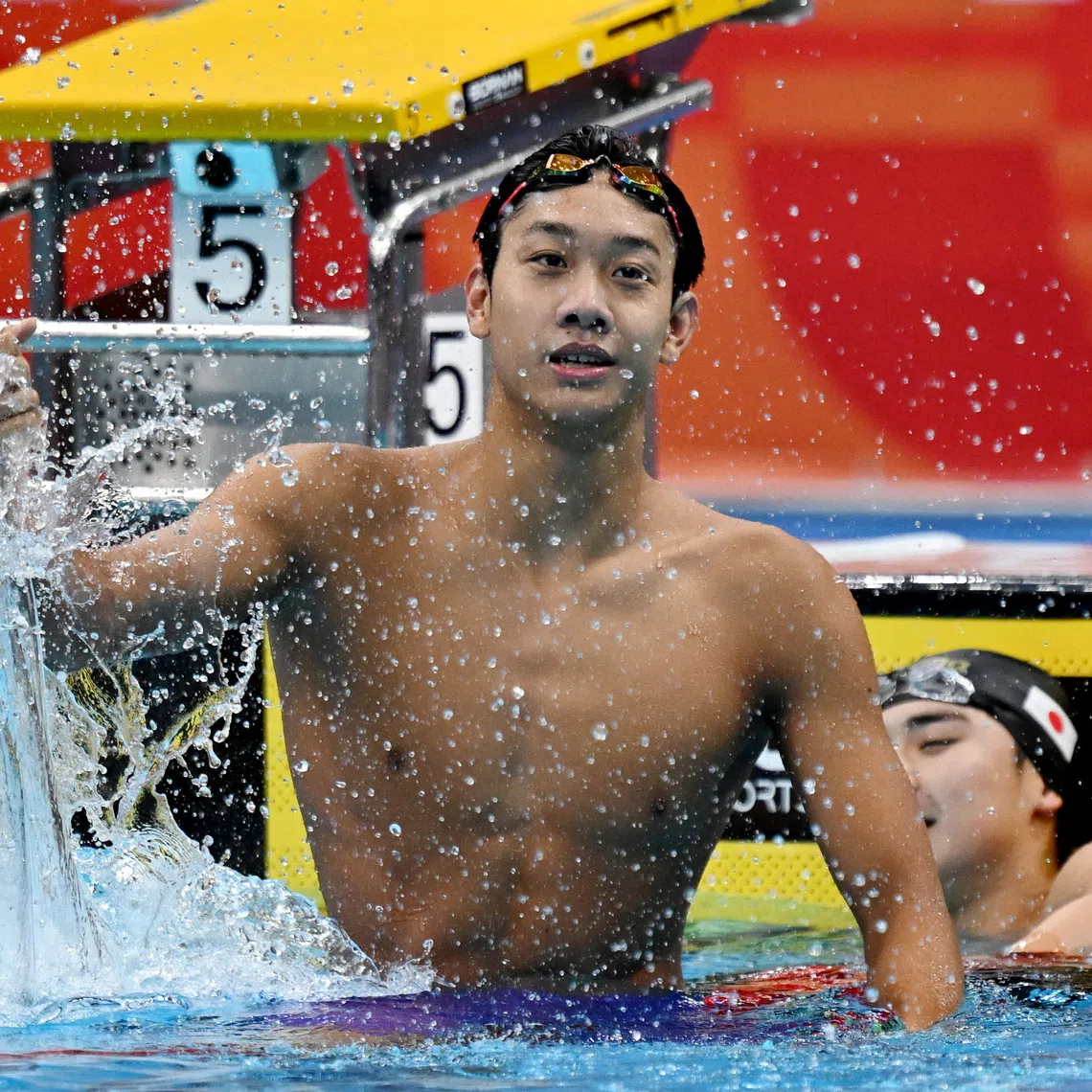 China’s Zhang Zhanshuo celebrates after winning gold medal in Men’s 400m Freestyle.