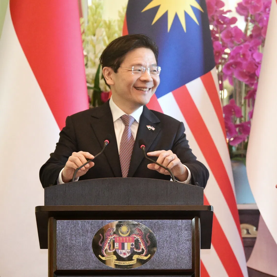 Prime Minister Lawrence Wong with his Malaysian counterpart Anwar Ibrahim at a joint press conference at the 11th Malaysia-Singapore Leaders’ Retreat in Putrajaya on Jan 7.
