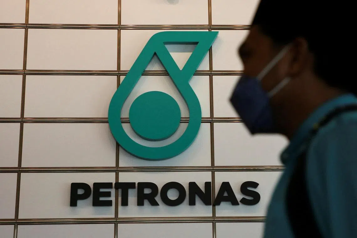 FILE PHOTO: A logo of Petronas is seen at their office in Kuala Lumpur, Malaysia, April 27, 2022. REUTERS/Hasnoor Hussain/File Photo